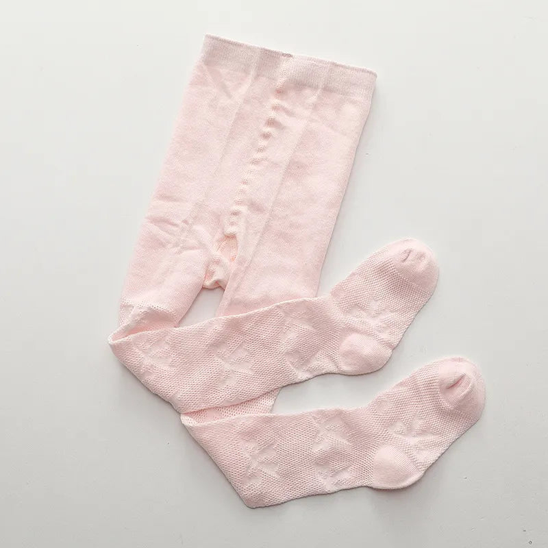 Collant fin fille nœud papillon rose