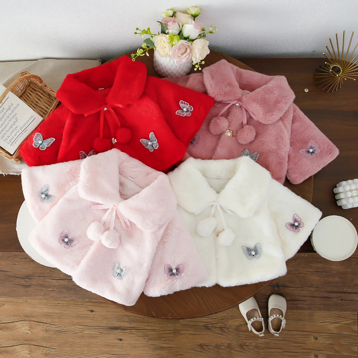 Gillet fausse fourrure papillon