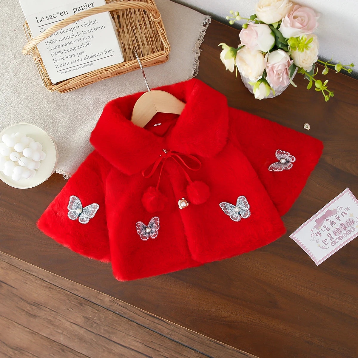 Gillet fausse fourrure papillon