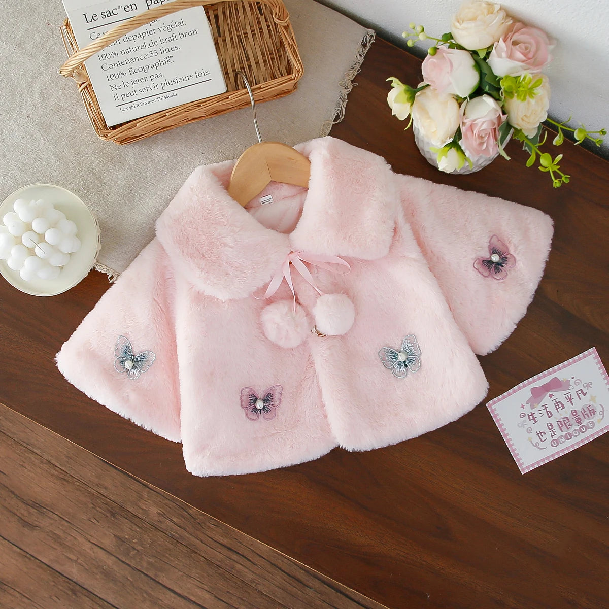 Gillet fausse fourrure papillon