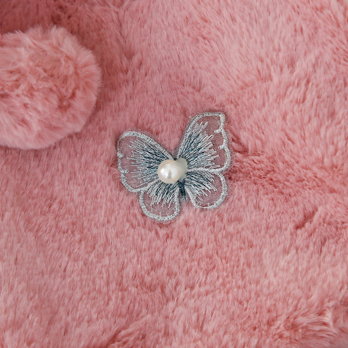 Gillet fausse fourrure papillon