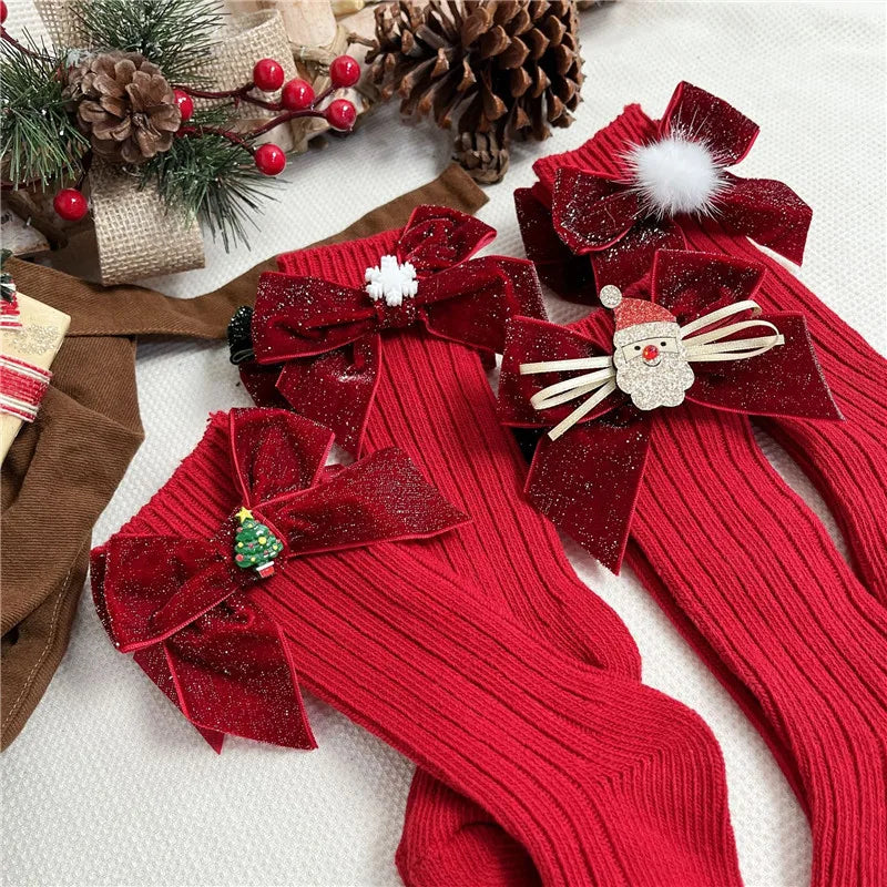 Chaussette de Noël pour fille rouge avec nœud papillon
