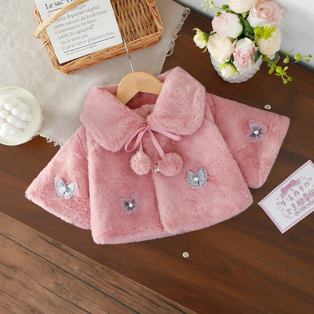 Gillet fausse fourrure papillon