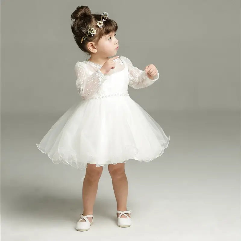 Robe baptême bébé aux manches transparentes