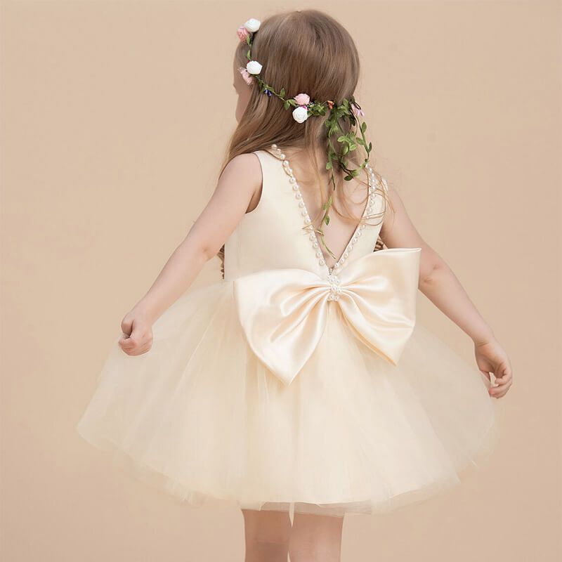 Robe enfant anniversaire champagne à perle