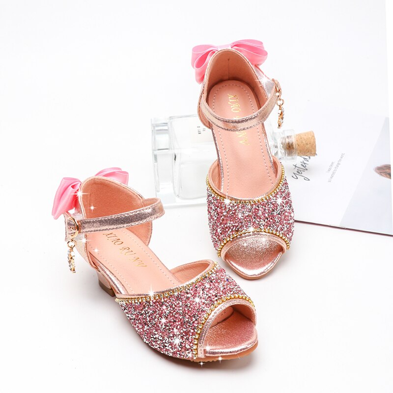 Sandale talon enfant nœud papillon et paillette rose