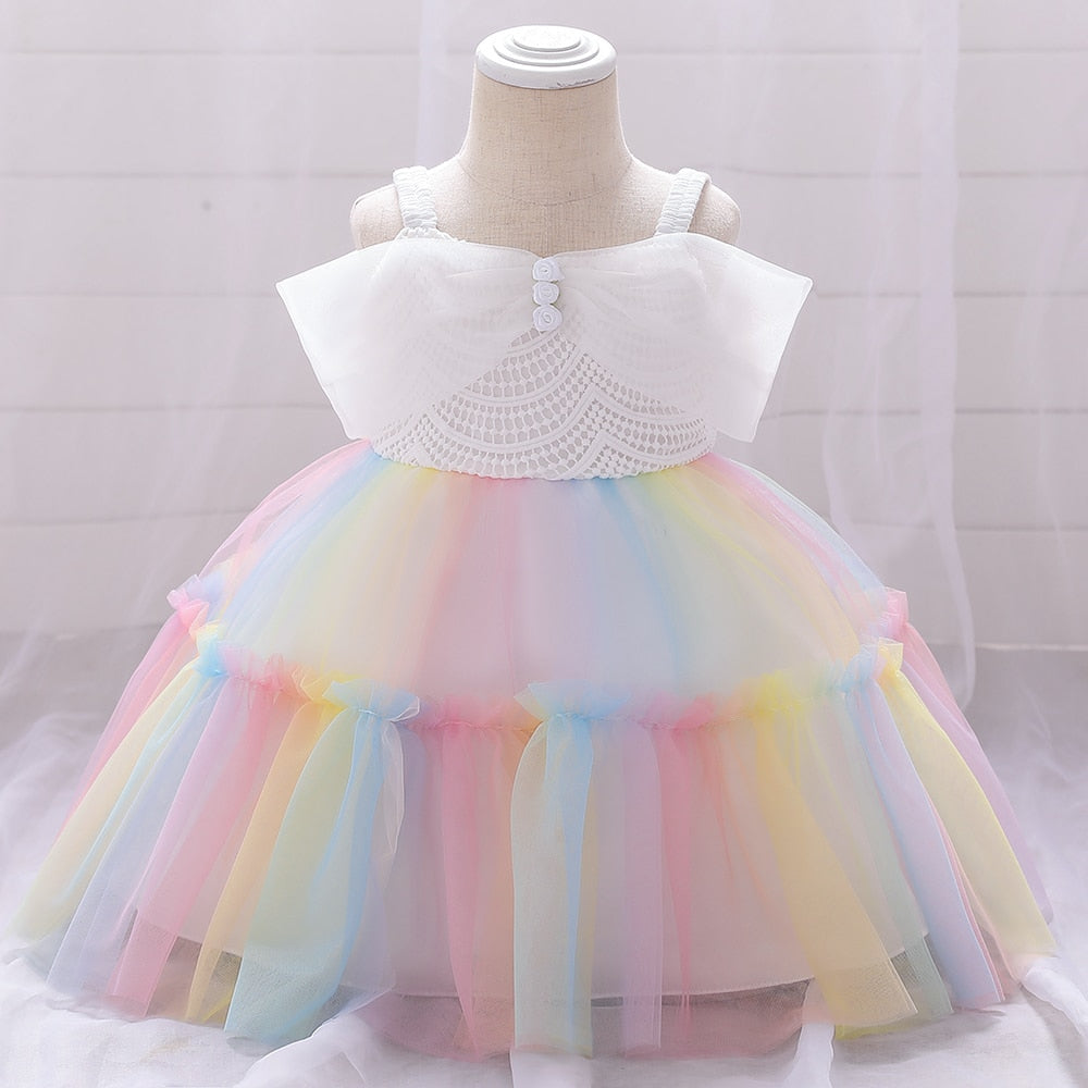 Robe bébé arc en ciel noeud blanc