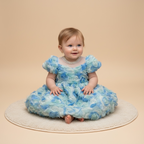 Vestido de cumpleaños para niña con roseta azul 