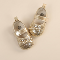 Chaussure bébé brillante dorée pour occasion spéciale, fille