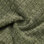 Texture en maille côtelée verte du haut de la robe automnale mère et fille