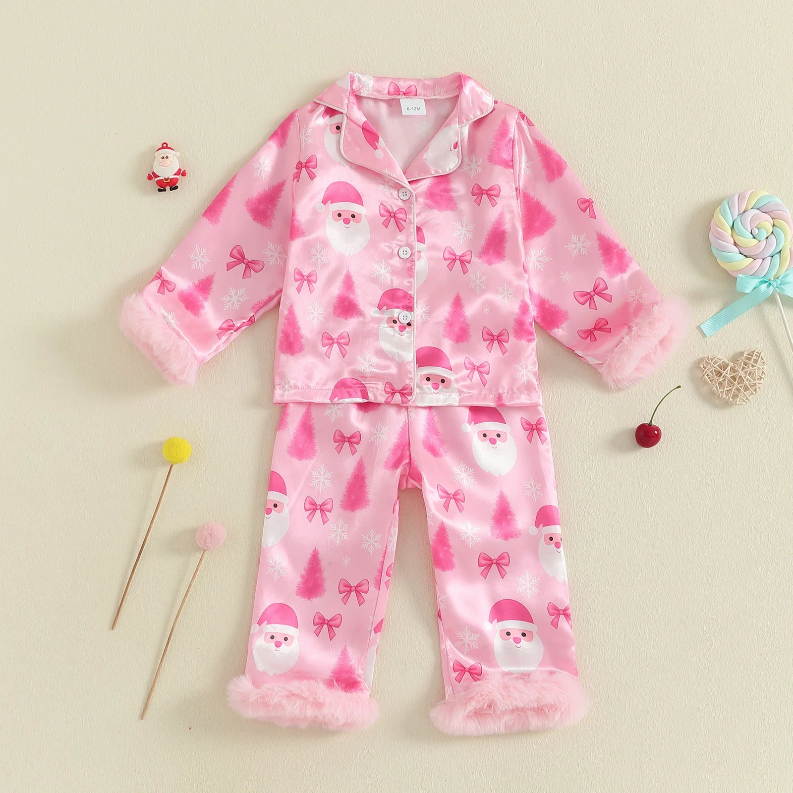 Pyjama Noël fille rose deux pièces avec boutons et poignets en fausse fourrure