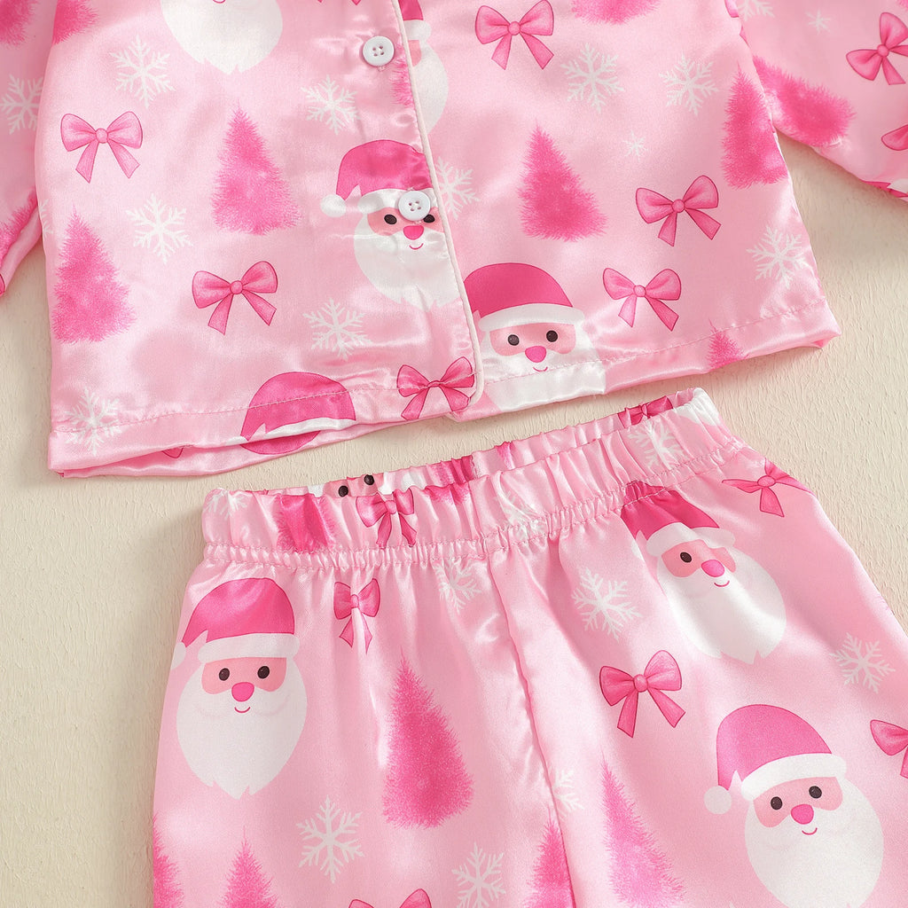 Zoom sur le pantalon du pyjama de Noël fille rose à taille élastique