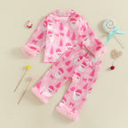 Ensemble pyjama fille rose de Noël vu de dos avec détails festifs