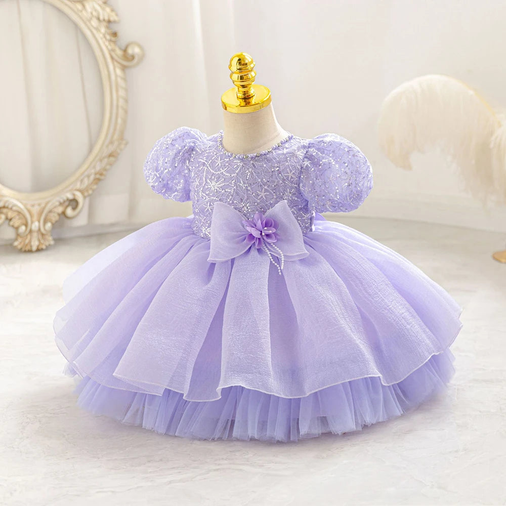 Robe bébé fille lilas à manches bouffantes et ruban à la taille, élégante et raffinée
