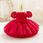 Dos de la robe bébé fille rouge avec fermeture discrète et nœud assorti