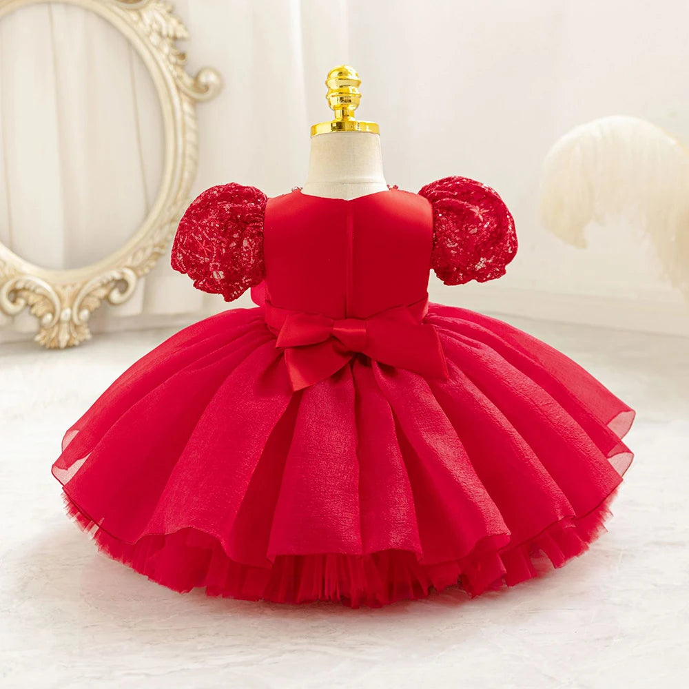 Dos de la robe bébé fille rouge avec fermeture discrète et nœud assorti