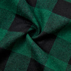 Texture du tissu à carreaux verts et noirs en coton doux