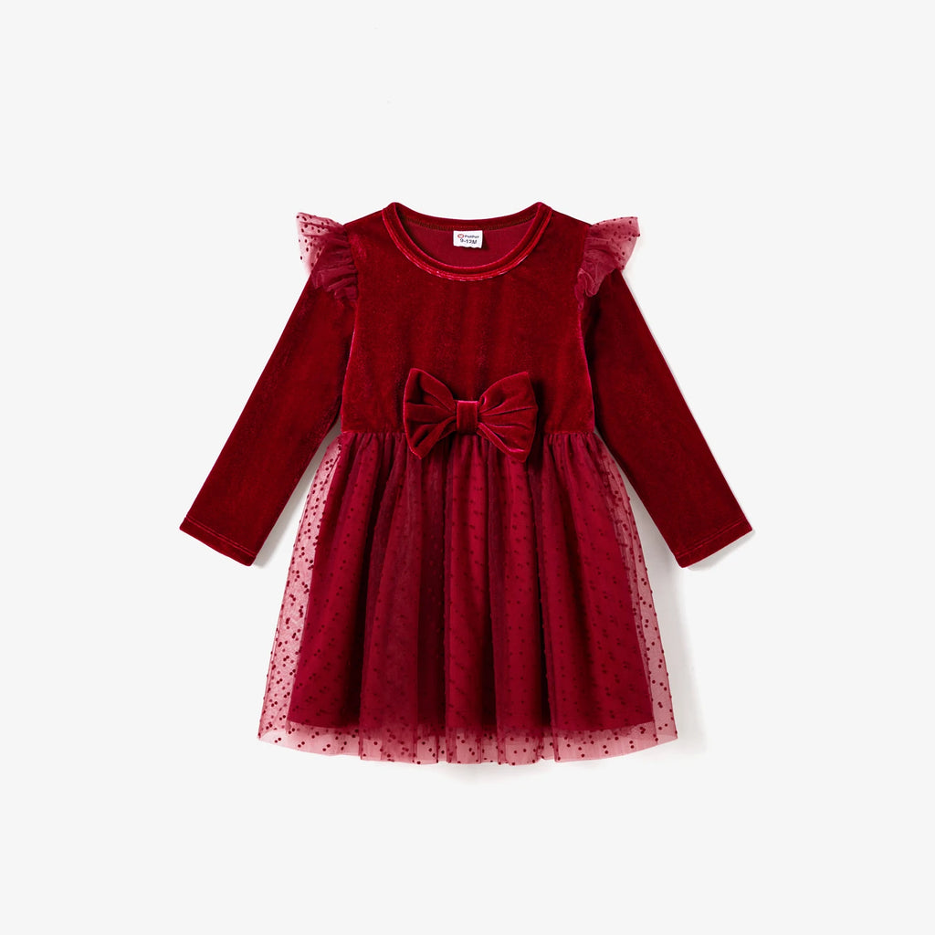 Robe enfant en velours rouge avec manches longues et jupe à pois délicate