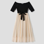 Robe femme noire et beige à manches mi-longues, jupe fluide en tulle et ceinture à nouer