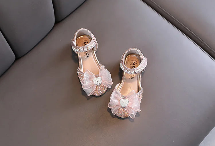 Sandali da bambina con fiocco e cuore