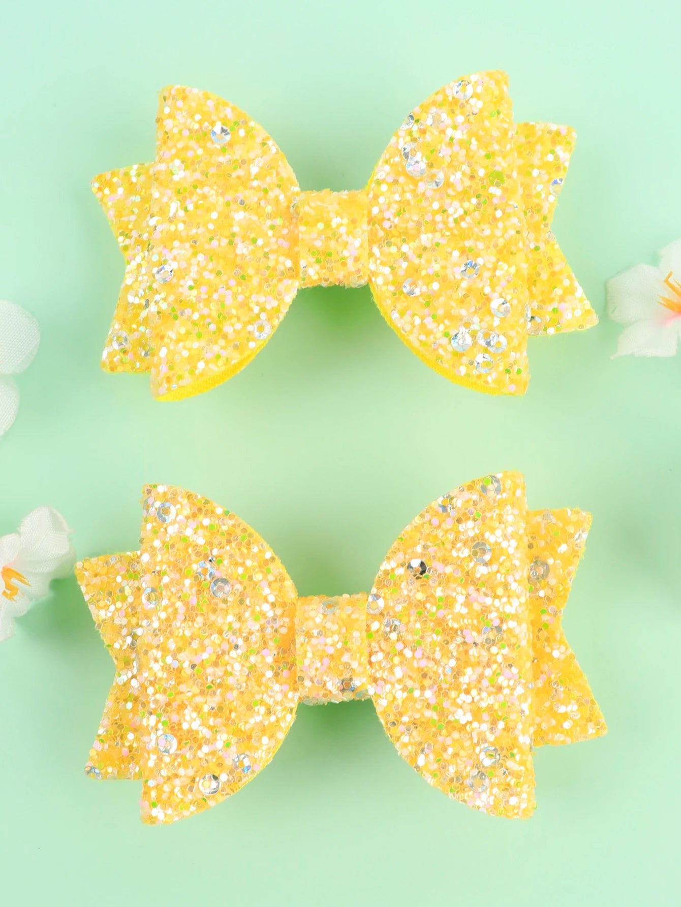 Lot de 2 pinces cheveux nœud papillon enfant doré