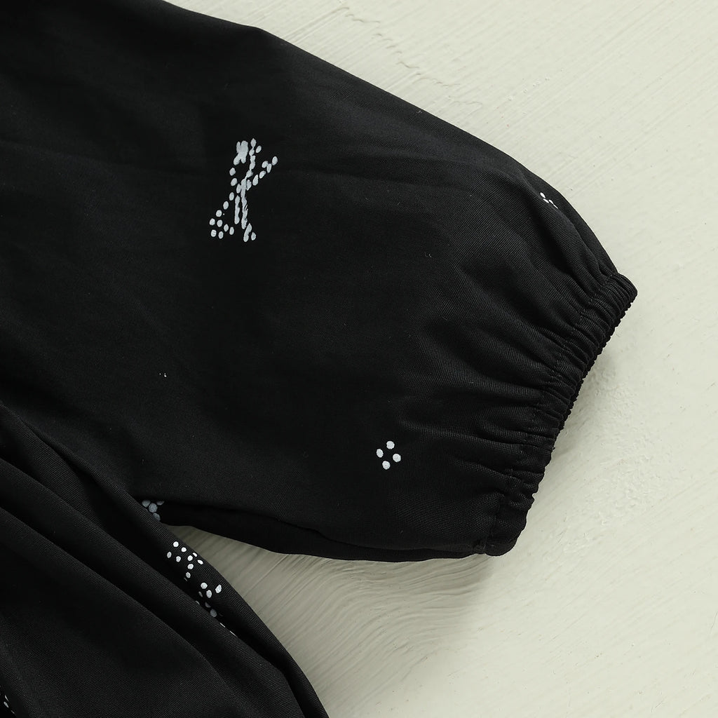 Conjunto infantil de dos piezas, blanco y negro.