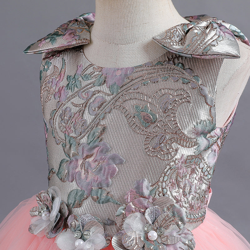 Elegante vestido de gala para niñas con un lazo en los hombros.