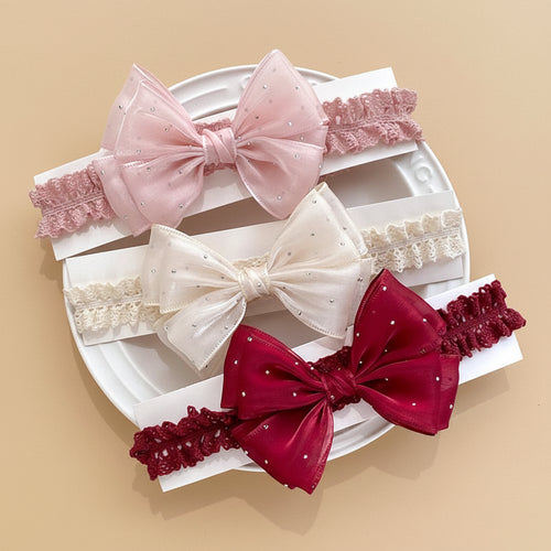 Bandeau bébé fille noeud en tissu à pois, rose poudré