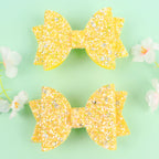 Lot de 2 pinces cheveux nœud papillon enfant jaune et brillant