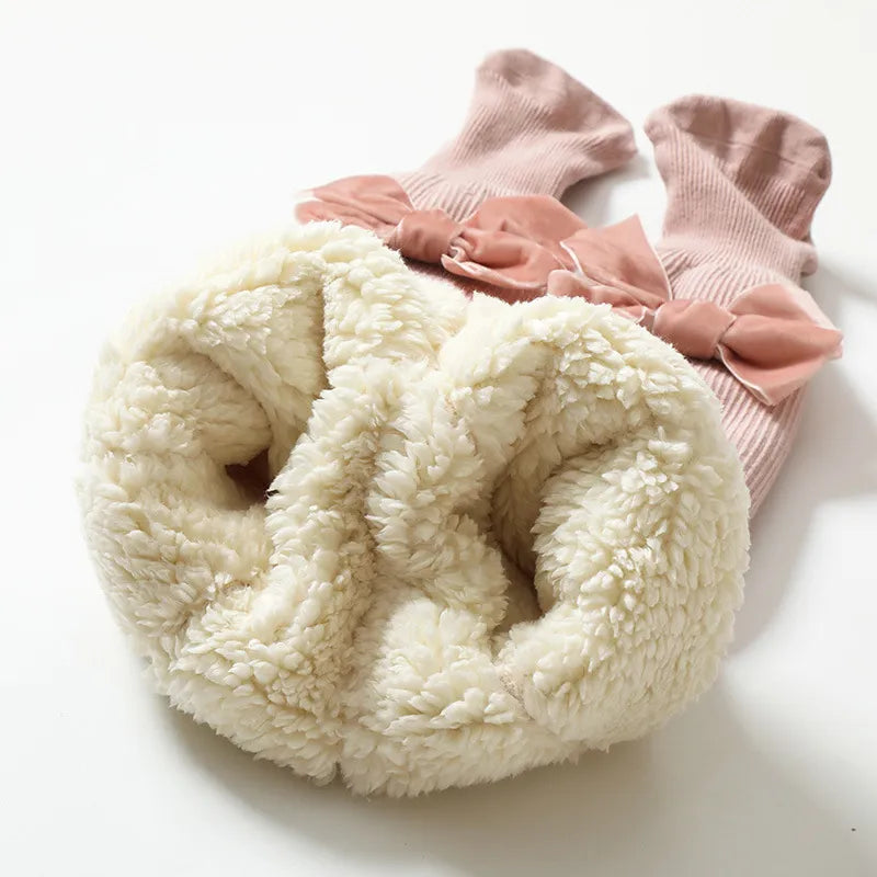 Collant polaire avec nœud papillon rose