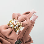 Serre tête nœud et strass fille rose