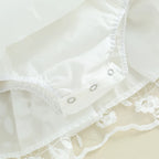 mameluco blanco para bebé Leva