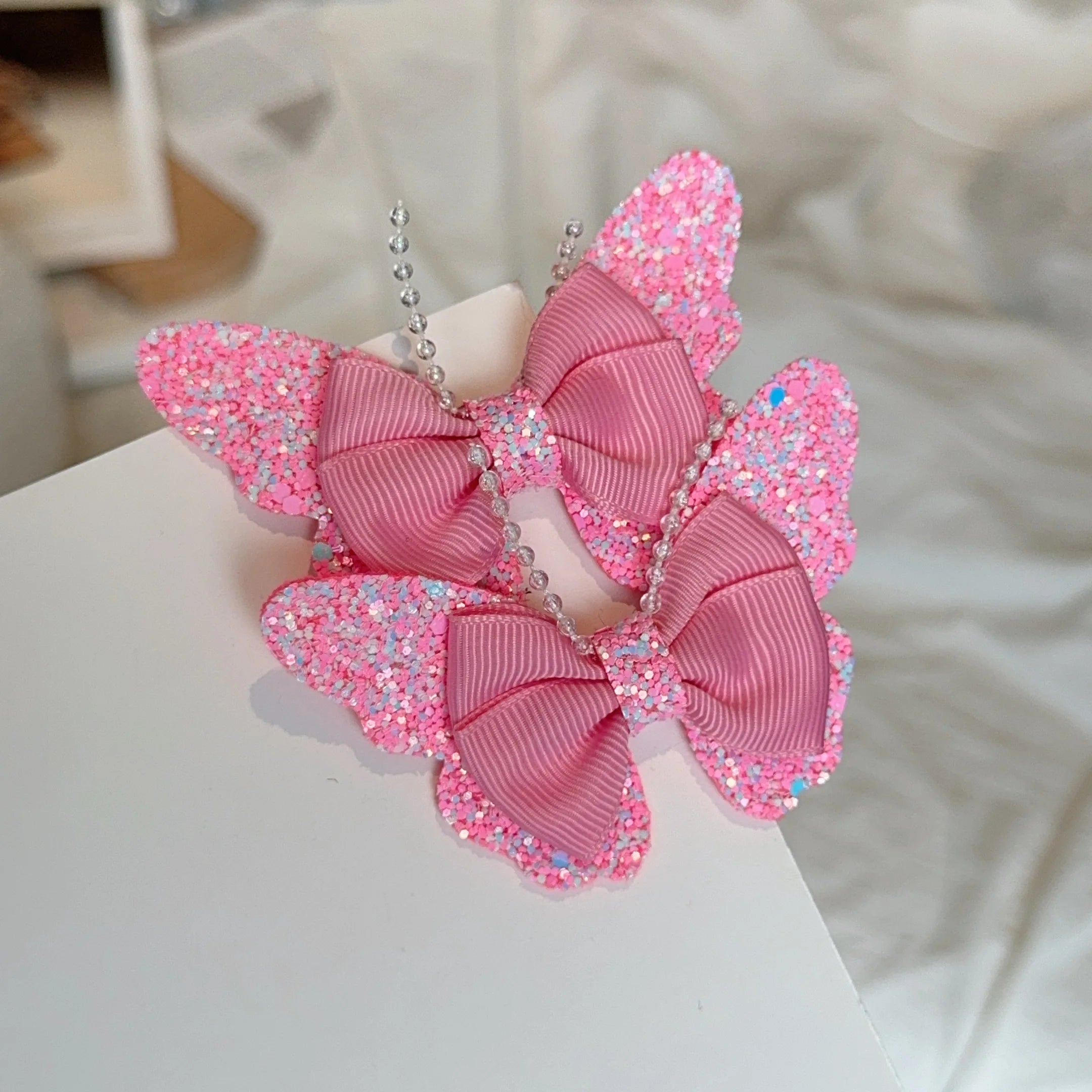 Set di 2 accessori a forma di farfalla