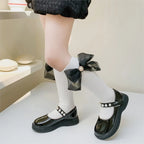 Chaussette longue noir/blanc nœud papillon