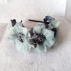 Diadema floral infantil