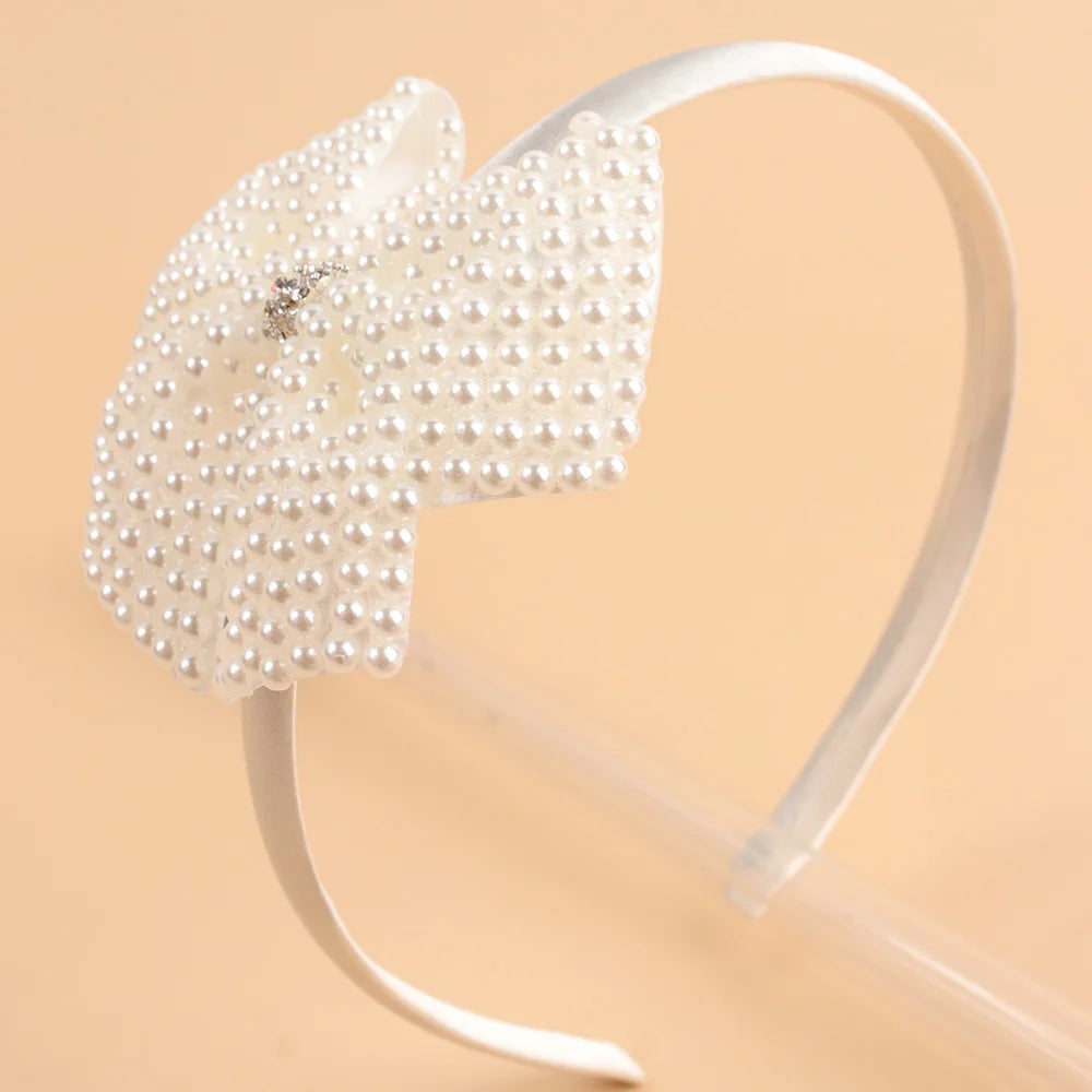 Serre tête nœud en perle fille