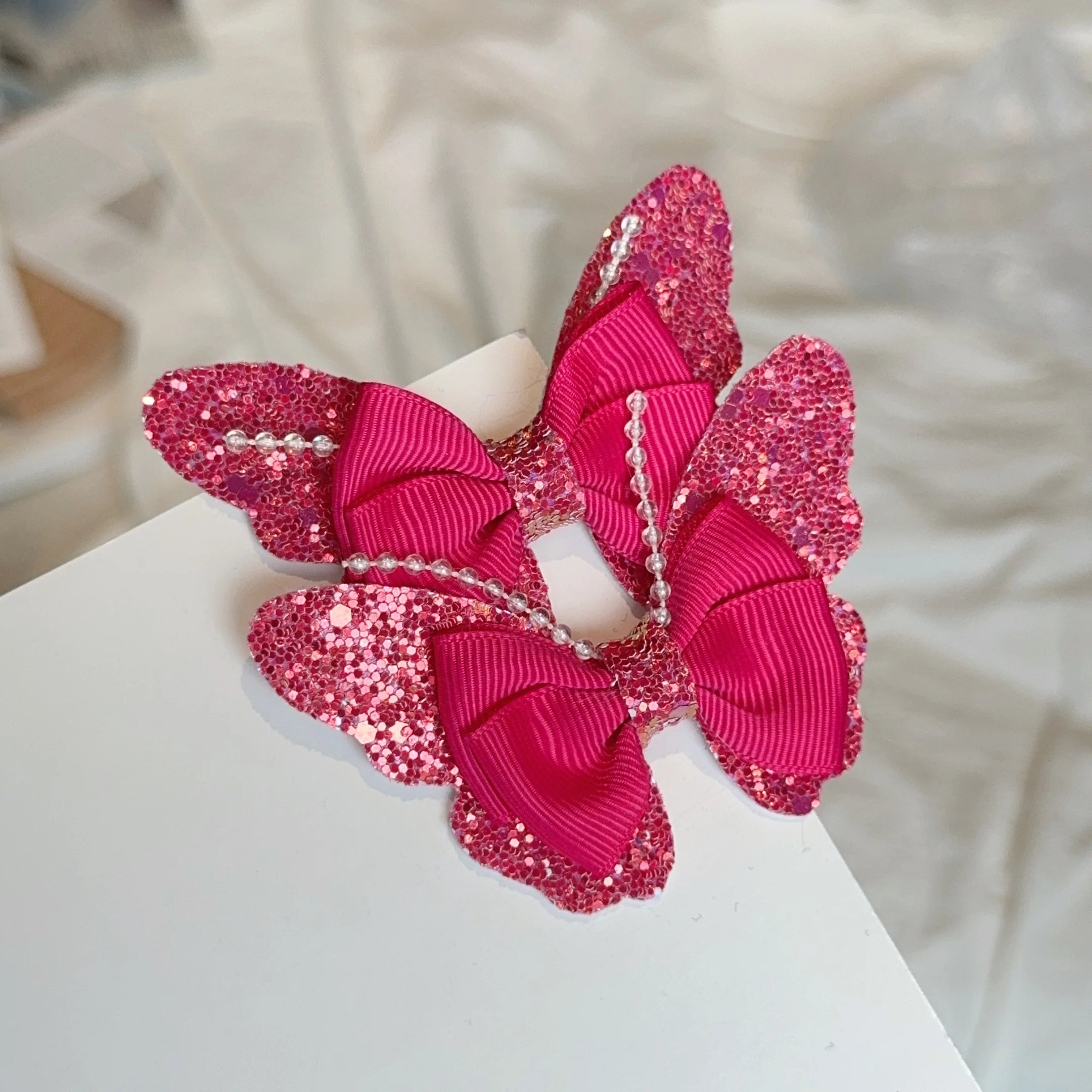 Set di 2 accessori a forma di farfalla