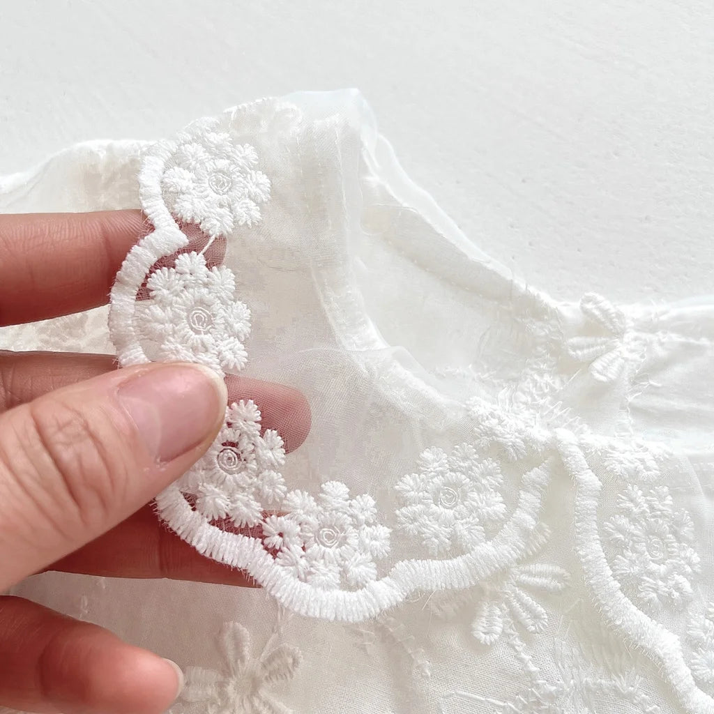 Tutina bianca per battesimo