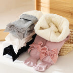 Collant molletonner avec nœud papillon