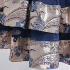 Elegante vestido de gala para niñas con un lazo en los hombros.