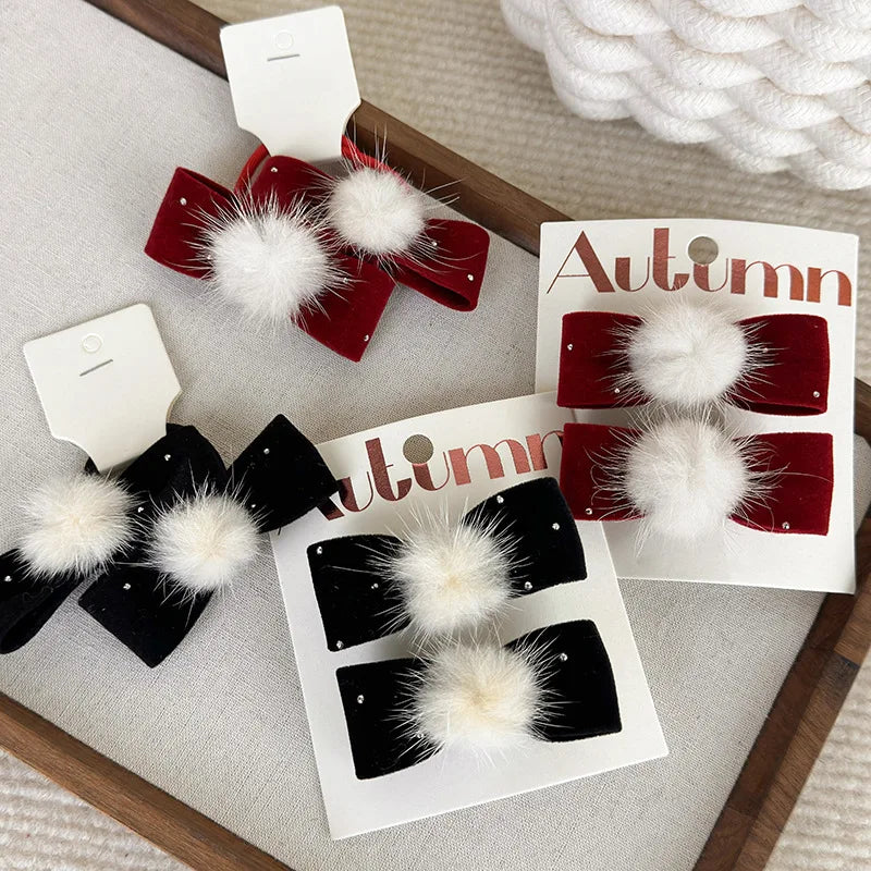 pinzas para el cabello o coleteros con pompones