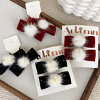 pinzas para el cabello o coleteros con pompones