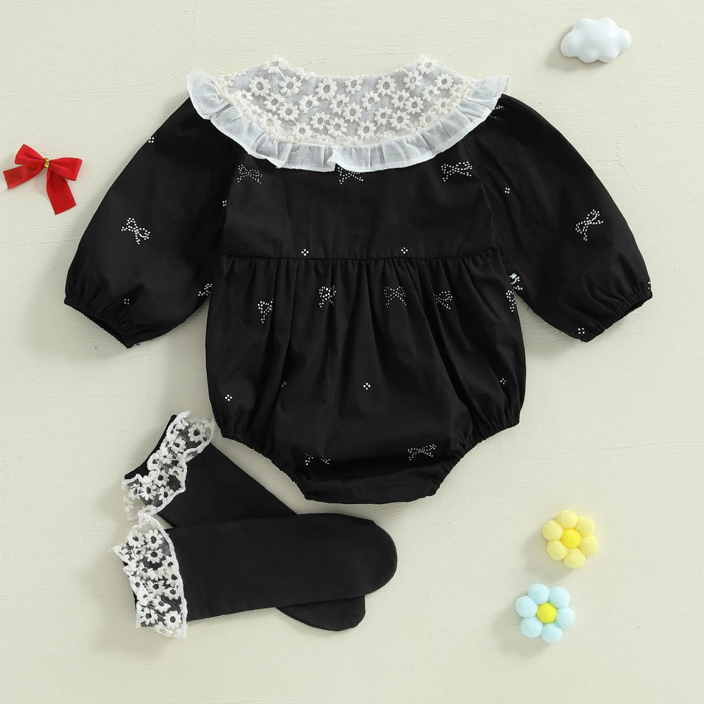 Conjunto infantil de dos piezas, blanco y negro.
