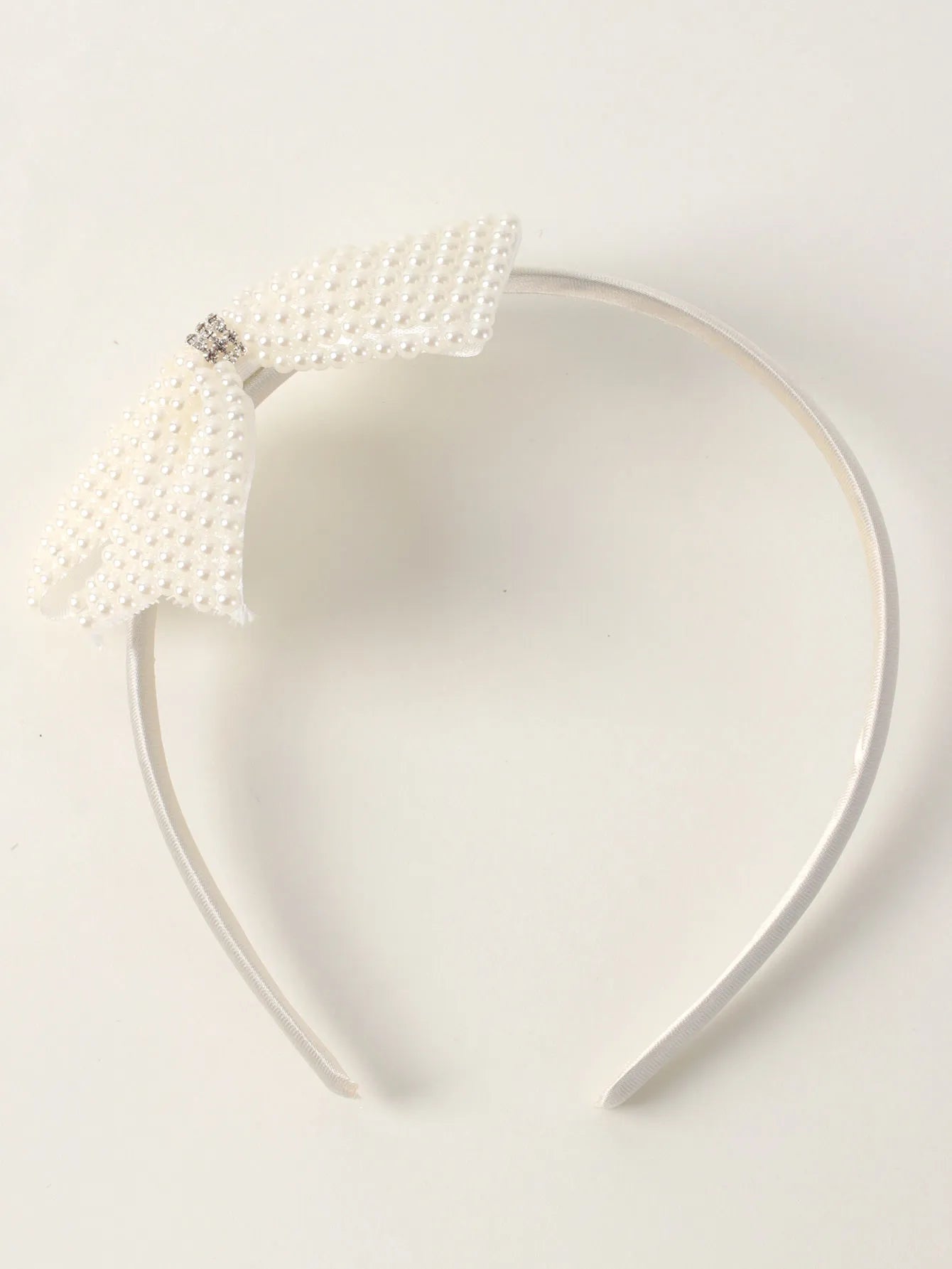 Serre tête nœud en perle fille