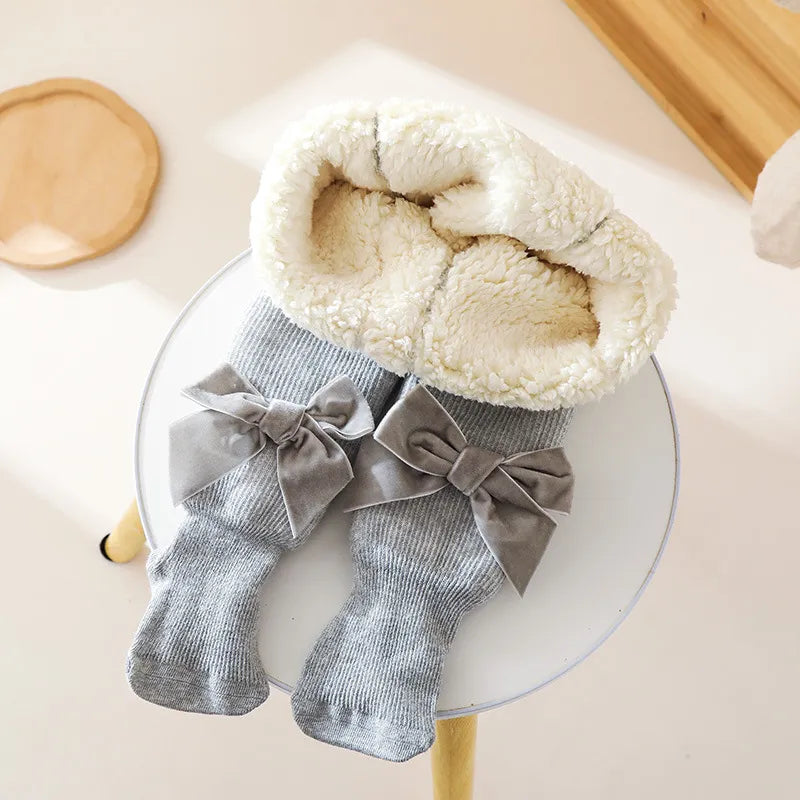 Collant molletonner avec nœud papillon gris