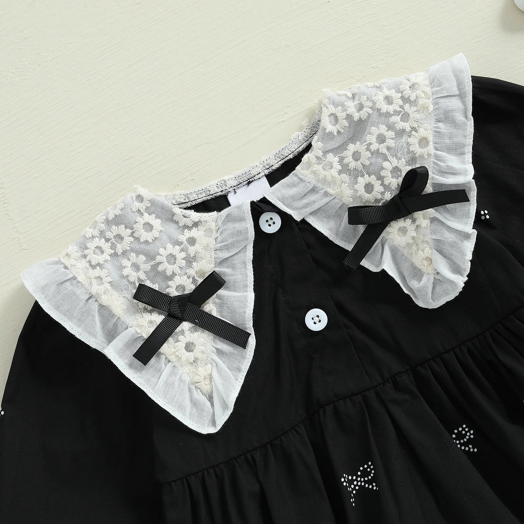 Conjunto infantil de dos piezas, blanco y negro.