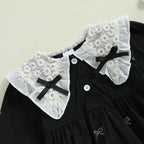 Conjunto infantil de dos piezas, blanco y negro.