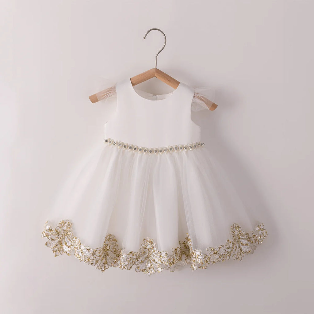 Abito e mantello per il compleanno dei bambini di Rita