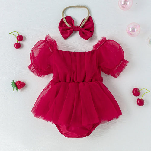 Barboteuse bébé Noël rouge, gros plan nœud à la taille