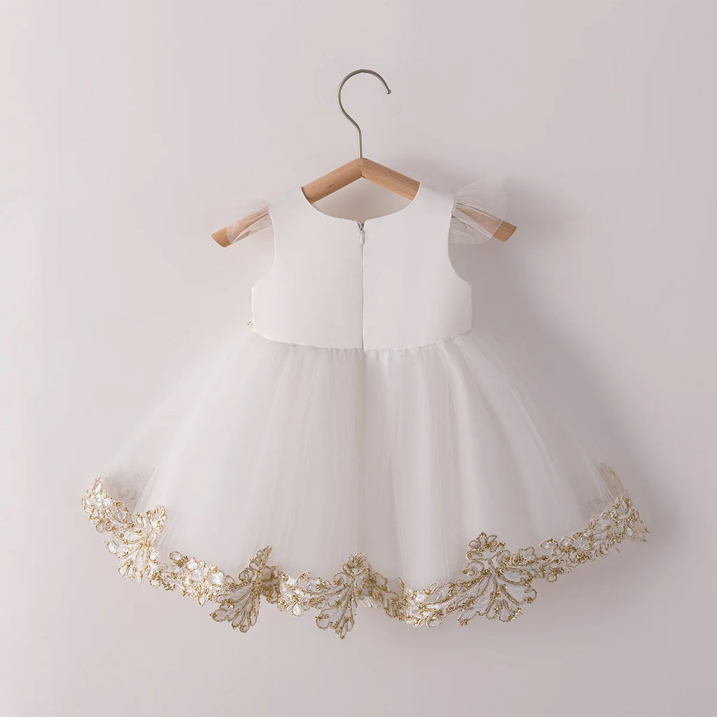 Abito e mantello per il compleanno dei bambini di Rita